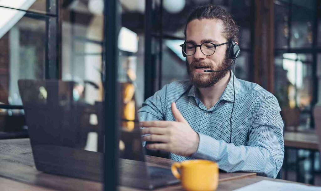 Person on video call in café