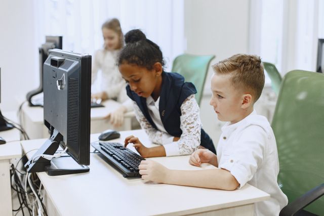 Students using Microsoft 365 laptops