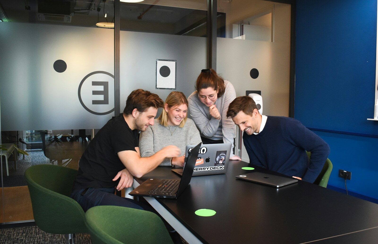 Business team discussing a problem with their IT provider around a table